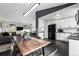 Open floor plan with a dining area connecting the kitchen and living room at 19661 E Girard Ave, Aurora, CO 80013