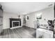 Stylish living area with modern fireplace and dedicated work space at 19661 E Girard Ave, Aurora, CO 80013