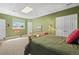 Comfortable bedroom with natural light, two closets, and a cozy, inviting atmosphere at 20957 Horse Bit Way, Morrison, CO 80465