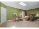 Charming bedroom with playful decor, features a cozy bed and a small table and chairs at 20957 Horse Bit Way, Morrison, CO 80465