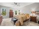 Bright bedroom offers large windows and a comfortable, inviting atmosphere at 20957 Horse Bit Way, Morrison, CO 80465
