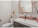 Stylish powder room featuring modern fixtures and finishes at 20957 Horse Bit Way, Morrison, CO 80465