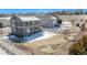 Spacious backyard with a white fence, garden boxes, and potential for outdoor enjoyment at 5367 Spring Ridge Trl, Castle Rock, CO 80104