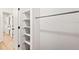 Walk-in closet with adjustable shelving and a hanging rod for optimal storage at 10311 E Evans Ave # 132, Aurora, CO 80247