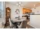 Dining space view showcasing an adjacent kitchen area with stainless steel appliances at 2855 Blue Sky Cir # 3-102, Erie, CO 80516