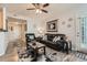 Comfortable living room with a leather sofa set, and stylish decor at 2855 Blue Sky Cir # 3-102, Erie, CO 80516