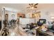 Open-concept living area flowing into the kitchen and dining room, perfect for entertaining at 2855 Blue Sky Cir # 3-102, Erie, CO 80516