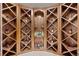 Custom wine cellar with unique wooden shelving at 850 E Radcliff Ave, Cherry Hills Village, CO 80113