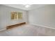 Cozy bedroom with carpet, ceiling fan, and a window with outside views at 1144 N Ogden St # 304, Denver, CO 80218