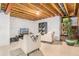 Partially finished basement space with exposed ceiling, creating potential for a cozy living area or entertainment room at 11687 Newton St, Westminster, CO 80031