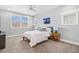 Cozy bedroom with neutral carpet, decor, and lots of natural light at 11687 Newton St, Westminster, CO 80031