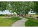 Neighborhood park featuring picnic tables, walking path and ' climbing structure at 11687 Newton St, Westminster, CO 80031