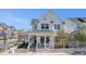 Charming two-story home featuring white siding, a cozy front porch, and a picket fence at 11687 Newton St, Westminster, CO 80031