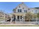 Charming two-story home featuring white siding, a cozy front porch, and a picket fence at 11687 Newton St, Westminster, CO 80031