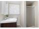 Cozy bathroom featuring a glass shower, vanity, and modern fixtures at 5643 S Fulton Way, Greenwood Village, CO 80111