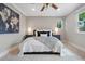 Cozy bedroom with modern decor, comfortable bedding, and stylish accents at 5643 S Fulton Way, Greenwood Village, CO 80111