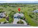Expansive aerial view of the property showcasing its stunning location and lush surroundings at 5608 Raintree Dr, Parker, CO 80134
