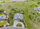 Stunning aerial shot of property with fire pit, swim spa, landscaping and large open space at 5608 Raintree Dr, Parker, CO 80134