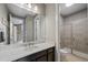Neutral bathroom with walk-in shower and sleek fixtures, offering a clean, modern design at 5608 Raintree Dr, Parker, CO 80134