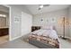 Cozy bedroom features neutral walls, carpet floors, and ceiling fan at 5608 Raintree Dr, Parker, CO 80134