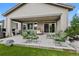 Inviting covered patio with comfortable seating perfect for outdoor relaxation and entertaining at 5608 Raintree Dr, Parker, CO 80134