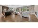 Open-concept design with living room, dining area, and kitchen, great for entertaining and Gathering gatherings at 5608 Raintree Dr, Parker, CO 80134