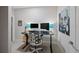 Modern home office featuring dual monitors, ergonomic chair, and a sleek desk setup at 5608 Raintree Dr, Parker, CO 80134