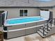 Private backyard swim spa with cover and steps, ideal for exercise and year-round enjoyment at 5608 Raintree Dr, Parker, CO 80134