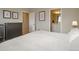 Bright bedroom featuring neutral walls, ensuite bathroom access and stylish decor at 4205 E Iliff Ave # 5, Denver, CO 80222