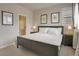 Tranquil bedroom includes a comfortable bed, side tables, and stylish decor to make for a peaceful night at 4205 E Iliff Ave # 5, Denver, CO 80222