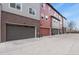 Attached garages with electric car chargers provide convenience for residents at 4205 E Iliff Ave # 5, Denver, CO 80222