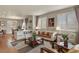 Cozy living room showcasing an open floor plan with an adjacent dining area and modern decor at 4205 E Iliff Ave # 5, Denver, CO 80222