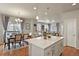 Open living space that connects kitchen, dining, and living rooms, creating a vibrant atmosphere at 4205 E Iliff Ave # 5, Denver, CO 80222