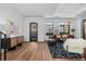 Inviting living room featuring wood floors, abundant natural light, and stylish modern decor at 105 Fillmore St # 209, Denver, CO 80206