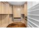 This is a very large, well-lit walk-in closet with drawers, shelves and cabinets at 105 Fillmore St # 209, Denver, CO 80206