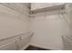 Walk-in closet with wire shelving and carpeting at 5677 S Park Pl # C111, Englewood, CO 80111