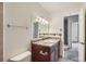 Bathroom featuring vanity and tiled floors at 6021 Yarrow St # B13, Arvada, CO 80004