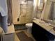 Cozy bathroom with glass block shower and modern fixtures at 1825 Kendall St # 205, Lakewood, CO 80214