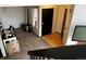 View from above of a home's entryway featuring a window and coat closet at 1825 Kendall St # 205, Lakewood, CO 80214
