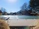 Outdoor pool with winter cover, ready for summer fun and entertainment at 1825 Kendall St # 205, Lakewood, CO 80214