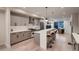 Sleek kitchen with stainless steel appliances, modern cabinets, and breakfast bar seating at 2466 S Cherokee St, Denver, CO 80223