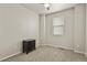 A neutral bedroom with carpet, a ceiling fan, and a single dresser at 9235 Quintero St, Commerce City, CO 80022