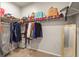 Walk-in closet with ample storage space and organized shelving and racks at 9235 Quintero St, Commerce City, CO 80022