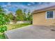The backyard features a well-maintained lawn and a concrete patio, perfect for outdoor entertaining at 3100 S Corona St, Englewood, CO 80113