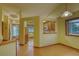Inviting dining area offering natural light and seamless access to the adjoining kitchen at 3100 S Corona St, Englewood, CO 80113