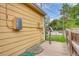 The home's exterior showing the utilities and fencing, and a concrete pad at 3100 S Corona St, Englewood, CO 80113