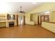 Spacious living room with wood floors, fireplace and sliding glass door that provides ample natural light at 3100 S Corona St, Englewood, CO 80113