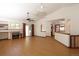 Spacious living room features a fireplace, wood floors, and ample natural light from sliding glass doors at 3100 S Corona St, Englewood, CO 80113