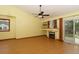 Bright living room featuring wood floors, a fireplace, and sliding glass door for outdoor access at 3100 S Corona St, Englewood, CO 80113