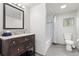 Bathroom featuring stylish vanity with sink, subway tile and modern fixtures at 1264 Beaver Brook Canyon Rd, Evergreen, CO 80439